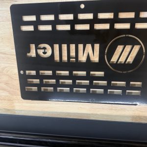 Alternative view of miller custom  front rotor cover powder coated black 300/350/400